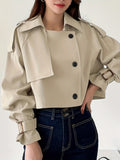 | Double-breasted trench coat in elegant design