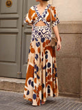 Geometric Print Puff Sleeve Diamond Cutout Twist Waist Maxi Dress