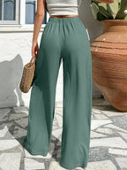 Asymmetrical High-waisted Loose-fitting Trousers With Pleats At The Waist