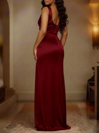Long Sleeveless Satin Dress With Slits And Pleats At The Hem