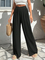Asymmetrical High-waisted Loose-fitting Trousers With Pleats At The Waist