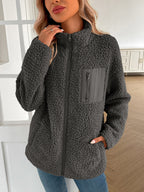 | Fluffy jacket with long sleeves and zip