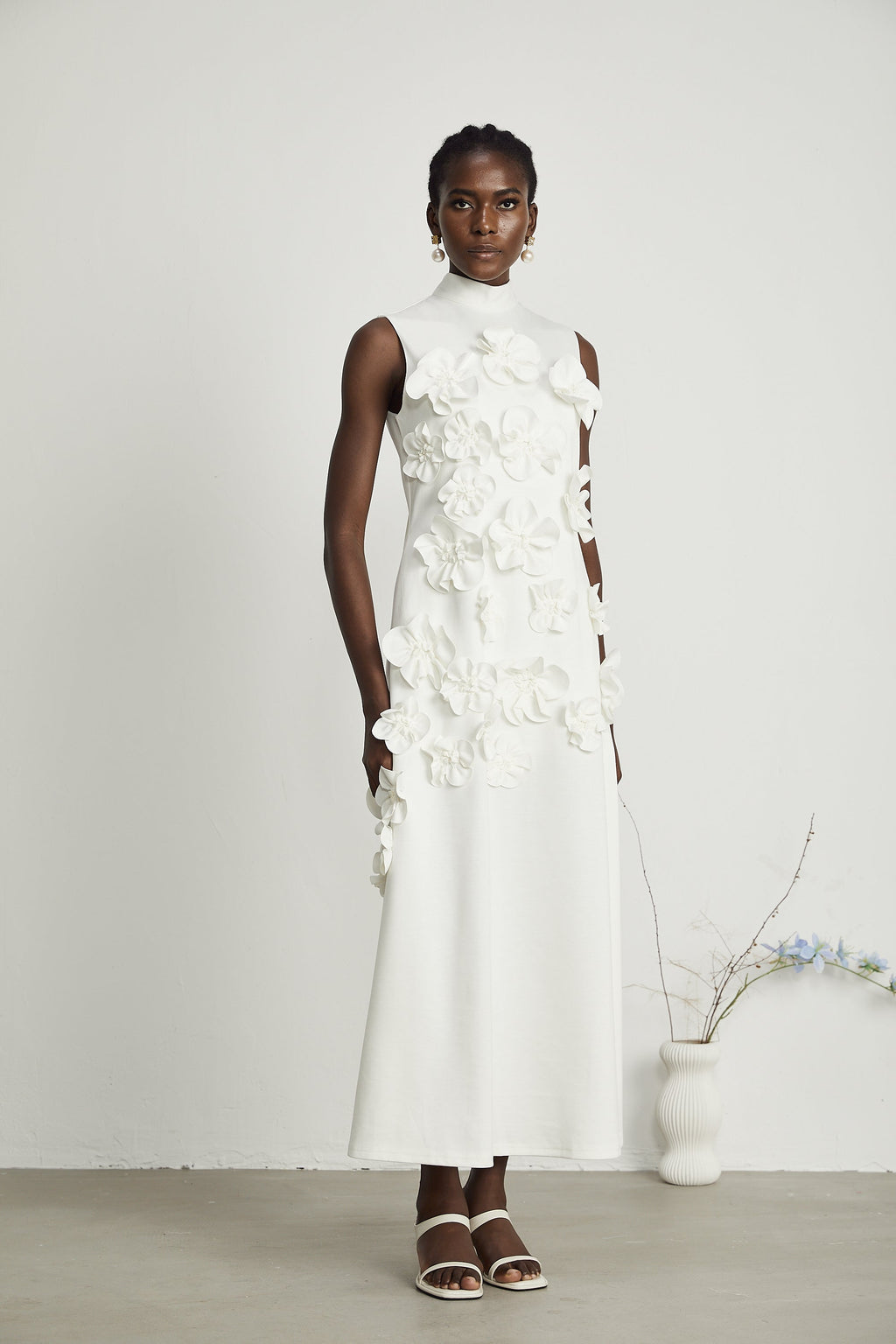 Magali White Sleeveless Maxi Dress with Faux Flower & Bow-Tie Embellishment