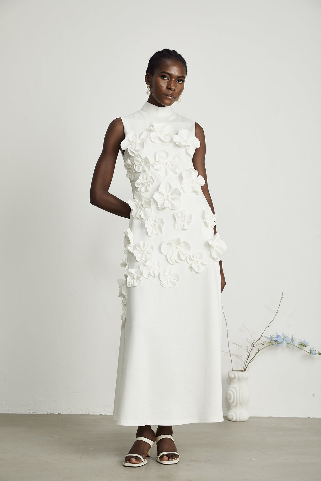 Magali White Sleeveless Maxi Dress with Faux Flower & Bow-Tie Embellishment