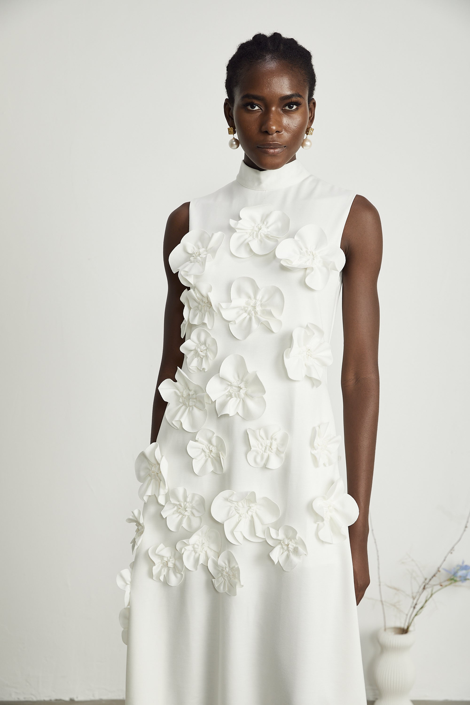 Magali White Sleeveless Maxi Dress with Faux Flower & Bow-Tie Embellishment