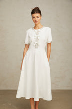 Cassiopeia crystal-accented bow midi dress in White