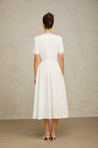 Cassiopeia crystal-accented bow midi dress in White