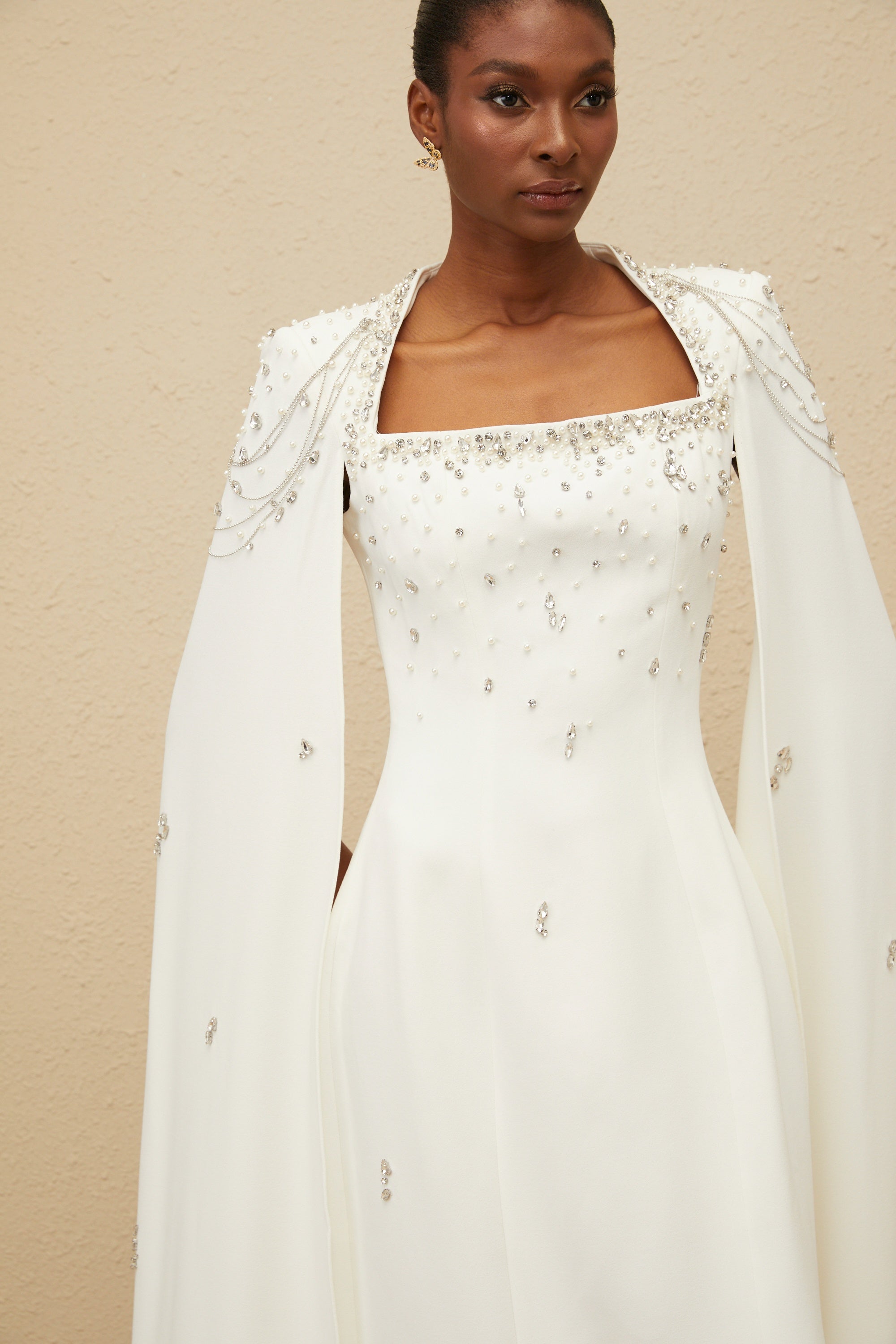 _puré White Embellished Cape Gown