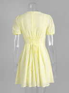 Yellow Eyelet Mini Dress With V-Neck And Puff Sleeves For Summer 2026