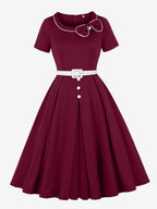 Contrast Piping Bow Neck Button Decor Pleated A Line Swing Dress For Women 2026