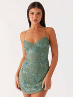Chic Fitted Orange Gown With Floral Sequin Detail Perfect For Parties