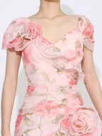 Flattering Pink Rose Patterned Maxi Gown With Asymmetrical Hem