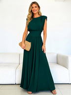 Chic Fitted Emerald Green Gown With Pleated Skirt Perfect For Formal Events