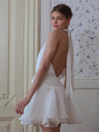 Flattering White Halter Mini Dress Ideal For Casual Outings