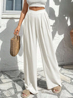 Asymmetrical High-waisted Loose-fitting Trousers With Pleats At The Waist