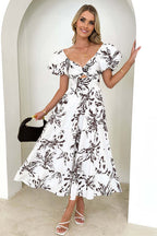 Off Shoulder Twist Front Cut Out Puff Sleeve Tiered Floral Maxi Dress