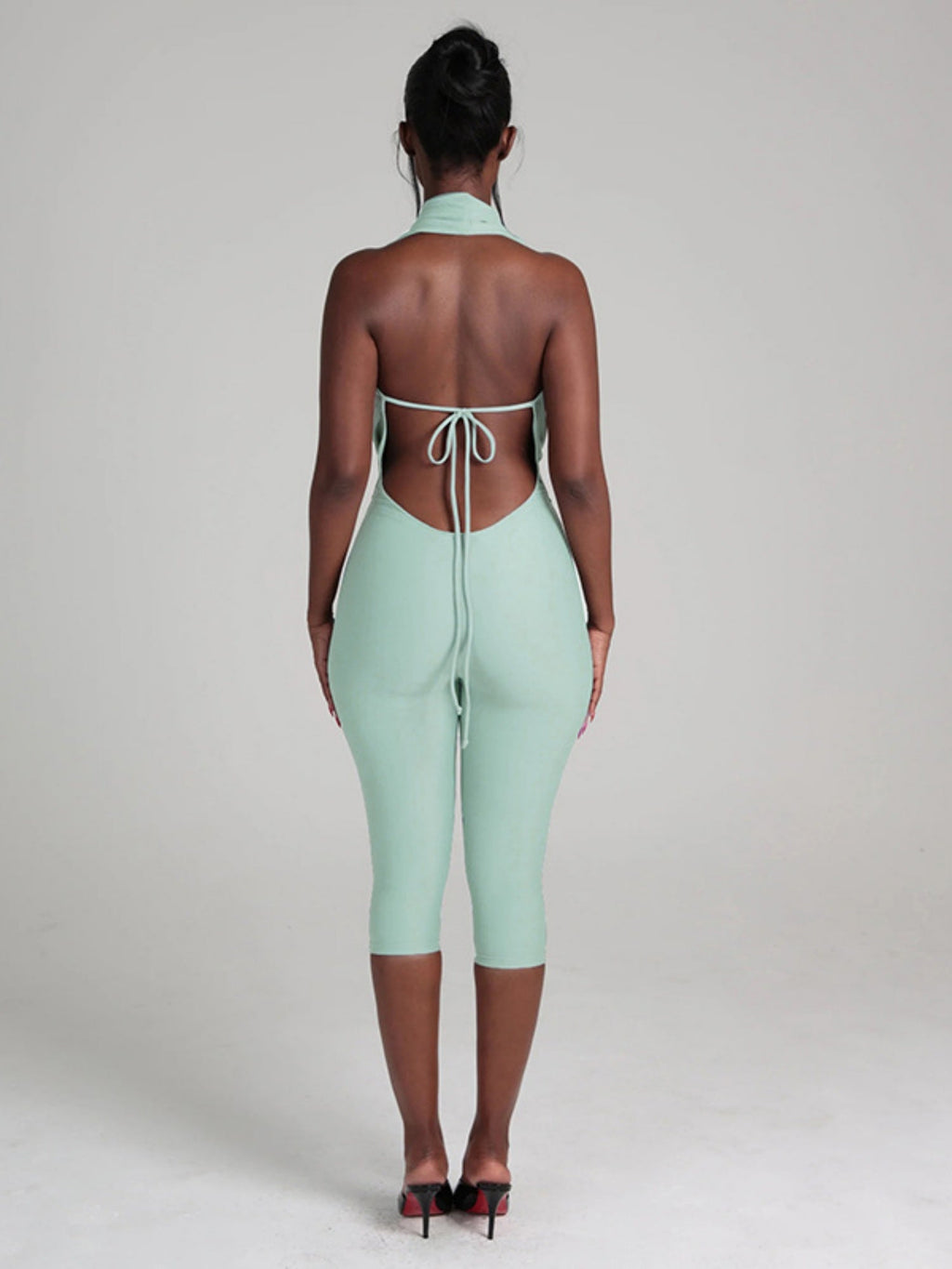 A Halter Neckline And Bare Back Tight-fitting Ropes Jumpsuits
