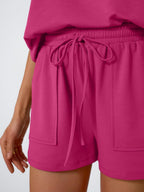 Round Neck Loose Short Sleeve Strappy Pocket Shorts Sports And Leisure 2-piece Sets