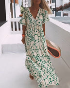 Yoselin Boutique Loose Fitting V Neck Dress with Print Chic Silhouette Collection