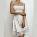 Lace hem solid cap sleeve zip-up ruched lace up mini dress