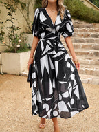 Waist-cinching Deep V-neck Floral Print Maxi Dresses