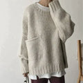| Ivory oversized sweater with front pocket