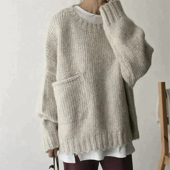 | Ivory oversized sweater with front pocket
