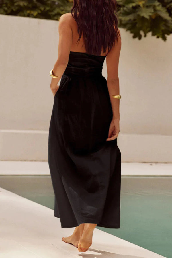 | Sleeveless dress with pocket pleats and halterneck