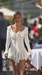 Ruffle Trim Deep V-Neck Tie Front Long Sleeve Tiered Asymmetric Hem Mini Dress