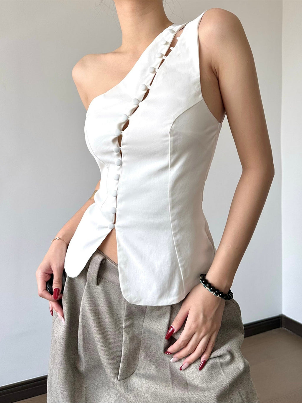 Hollow Out Asymmetrical Collar Buttons Tank Tops