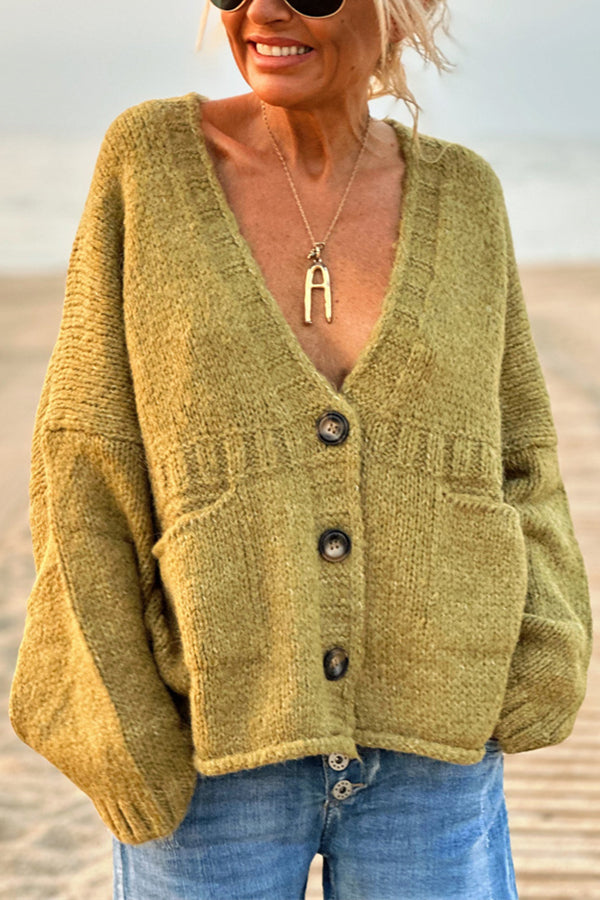 | Solid color loose long sleeve knitted sweater with V-neck and pocket
