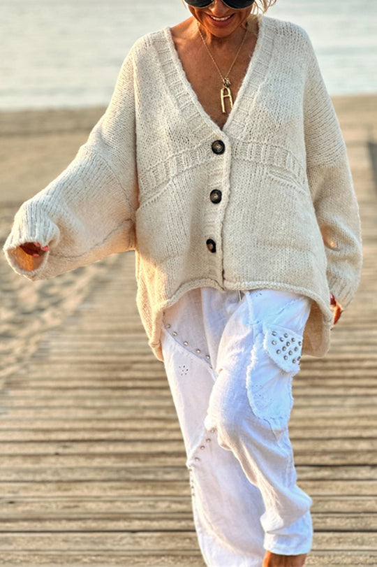 | Solid color loose long sleeve knitted sweater with V-neck and pocket