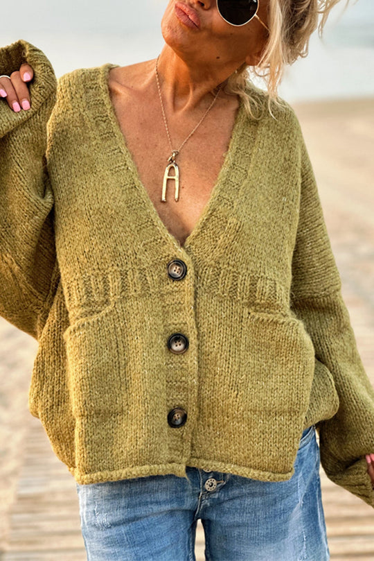 | Solid color loose long sleeve knitted sweater with V-neck and pocket