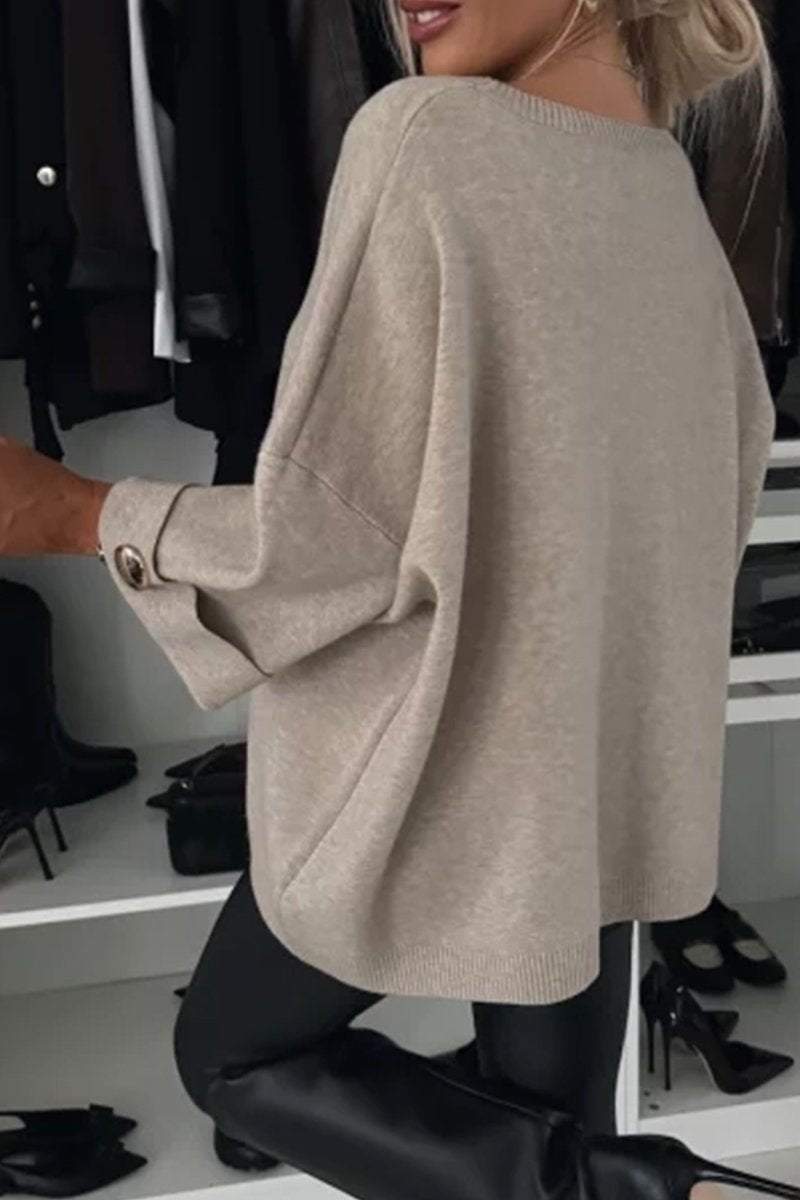 | Knitted sweater with button detail and half sleeves