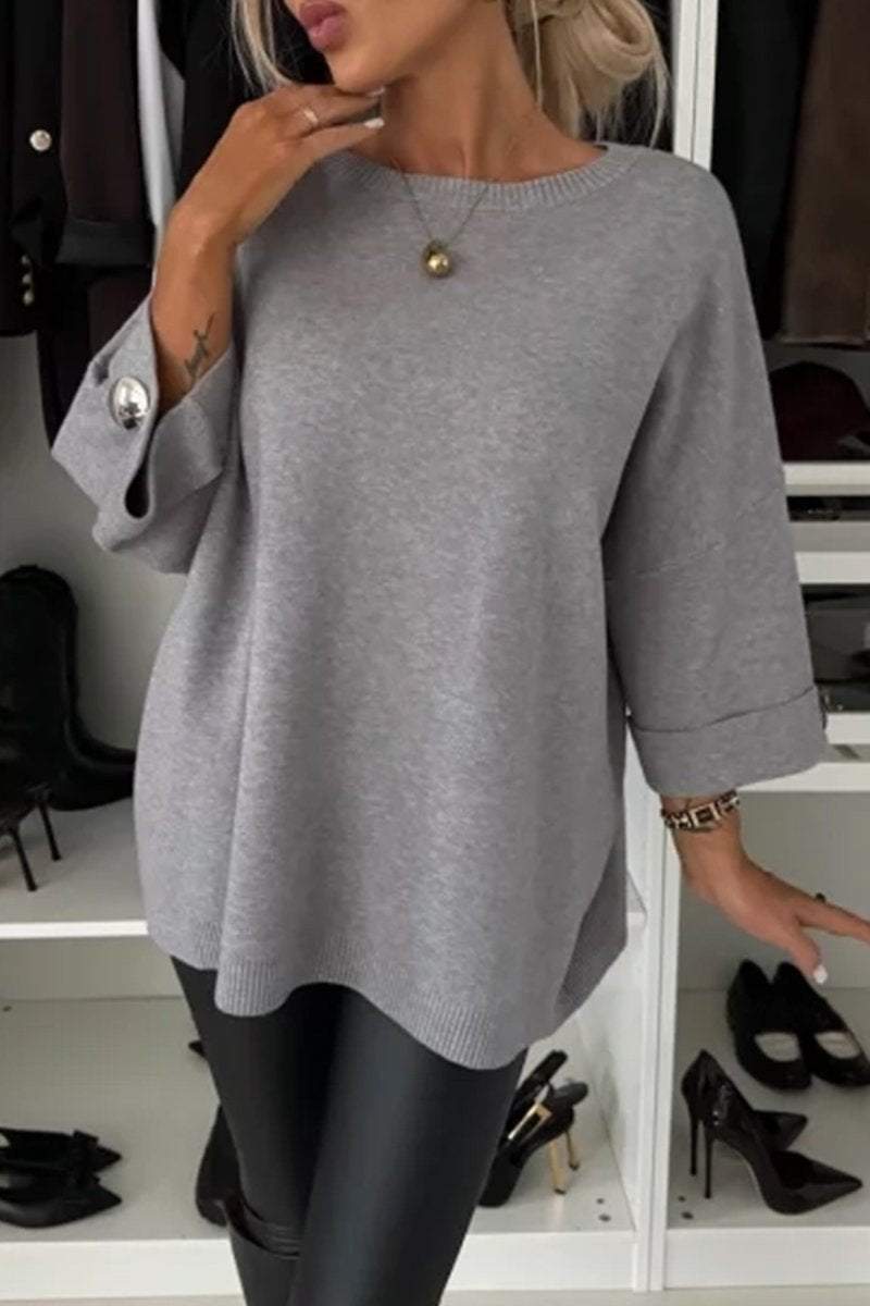| Knitted sweater with button detail and half sleeves