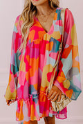 Laura Effortless Long Sleeve Mini Dress with Ruffle Hem and Color Block V Neck Statement Occasion Edit
