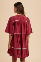 Aaliyah Boutique Tiered Dress with Tassels and Contrast Trim, Tied Neckline, Half Sleeves Designer Edit