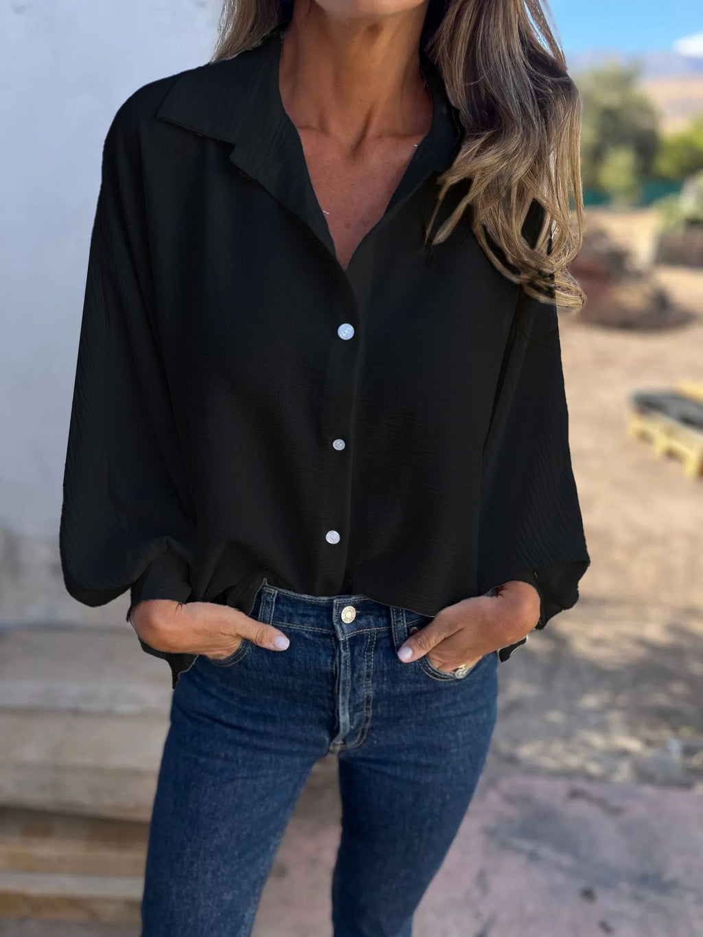 Elegant plain button-up shirt for women