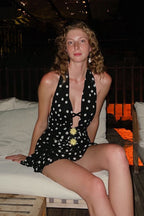 Black Halter Criss Cross Strap Daisy Accent Polka Dot Mini Dress
