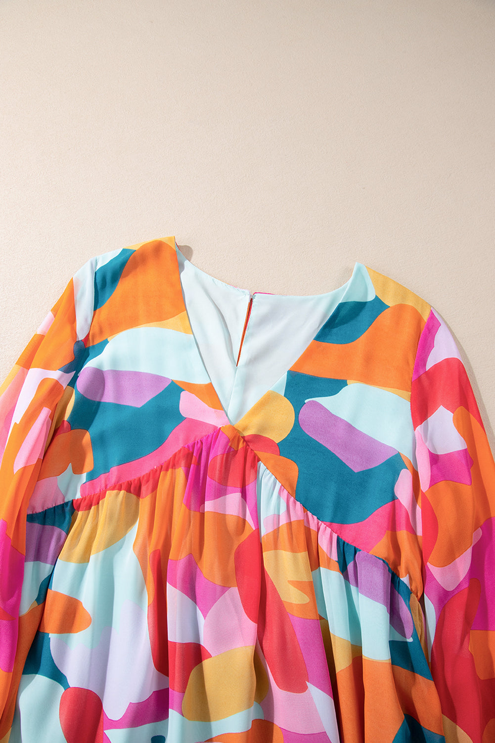 Laura Effortless Long Sleeve Mini Dress with Ruffle Hem and Color Block V Neck Statement Occasion Edit