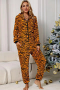 Blue Zone Planet | Animal Print Zip-Up Hooded Flannel Jumpsuit with Pockets