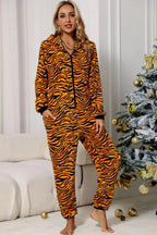 Blue Zone Planet | Animal Print Zip-Up Hooded Flannel Jumpsuit with Pockets
