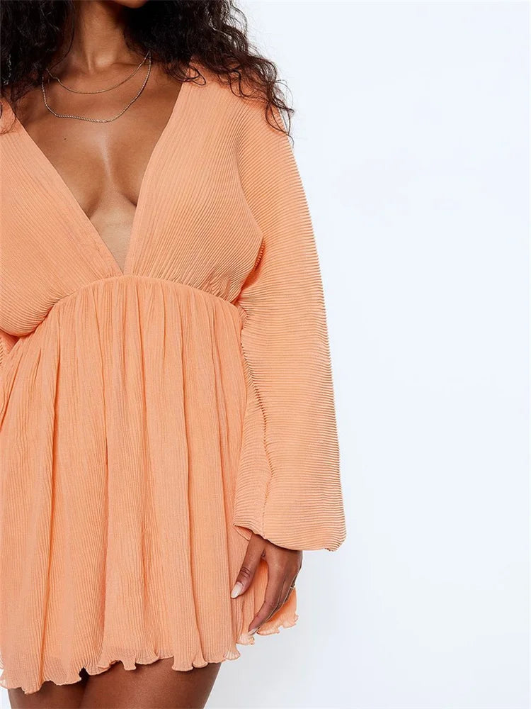 Plissé Deep V-Neck Bell Sleeve Empire Waist Mini Dress
