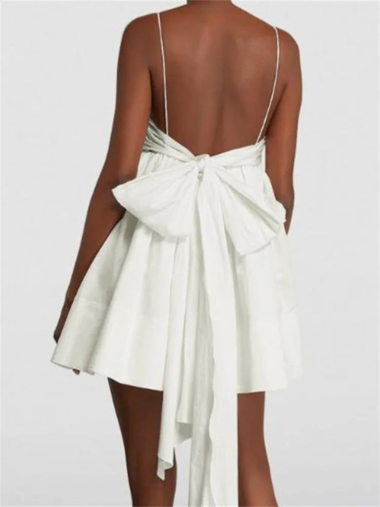 Ruched Empire Waist Bubble Hem Tie Back Spaghetti Strap Mini Dress