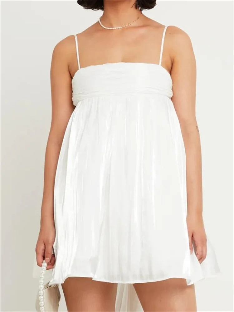 Ruched Empire Waist Bubble Hem Tie Back Spaghetti Strap Mini Dress
