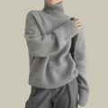 | Women’s High Neck Relaxed Fit Merino Wool Sweater