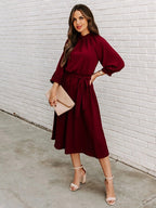 Gathered Mock Neck Lantern Sleeve Tie Waist A-Line Midi Dress