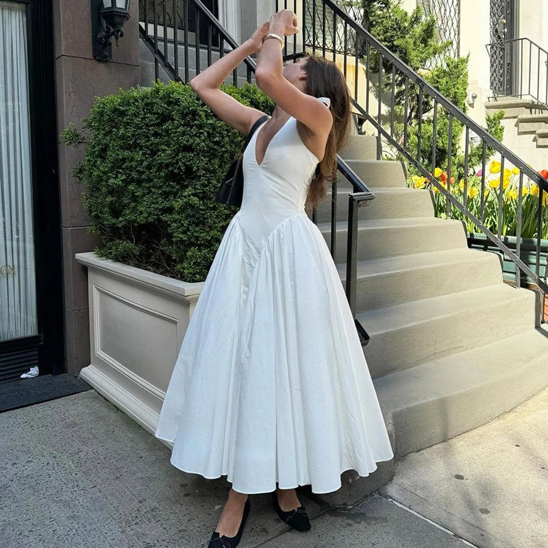 Halter Plunging V-Neck Drop Waist Pleated Fit and Flare Midi Dress