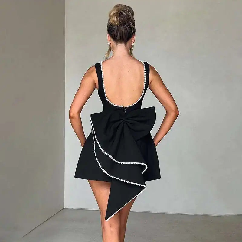 Pearl Trim Neckline Princess Seam Oversized Bow Back Fit and Flare Mini Dress