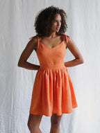 Tie Shoulder Bow Backless V-Neck Pleated Mini Dress